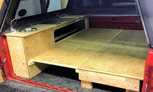 the-finished-bed-platform-for-our-DIY-Truck-Topper-Camper-copy